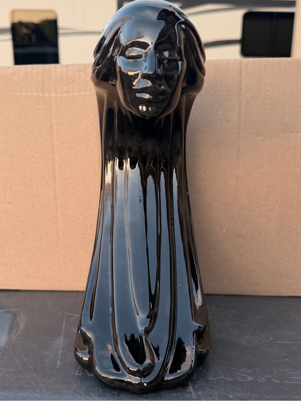 Vintage woman of the wind statue